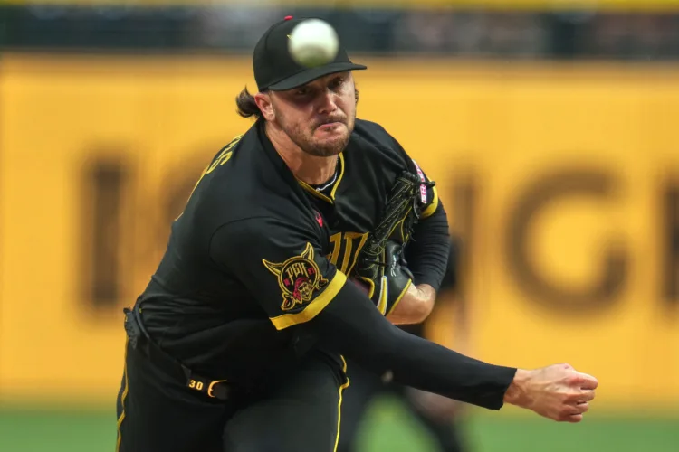 Reds top Pirates in back-and-forth game